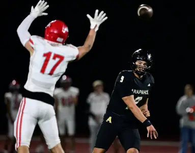 Sophomore QB Theo Lee helps Arapahoe thump rival Heritage in Milk Jug Classic
