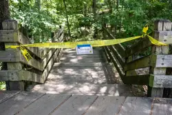 Arkansas teacher charged with killing couple who were hiking in Devil’s Den with their kids